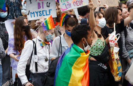People take part in the Gay Pride - also known as the lesbian, gay, bisexual and transgender people- LGBT pride March 26 June 2021 at the streets of Paris, France.のeditorial素材
