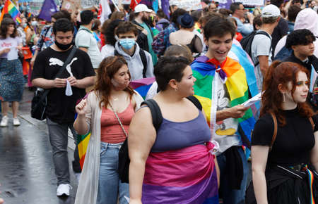 People take part in the Gay Pride - also known as the lesbian, gay, bisexual and transgender people- LGBT pride March 26 June 2021 at the streets of Paris, France.のeditorial素材