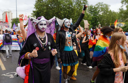 People take part in the Gay Pride - also known as the lesbian, gay, bisexual and transgender people- LGBT pride March 26 June 2021 at the streets of Paris, France.のeditorial素材