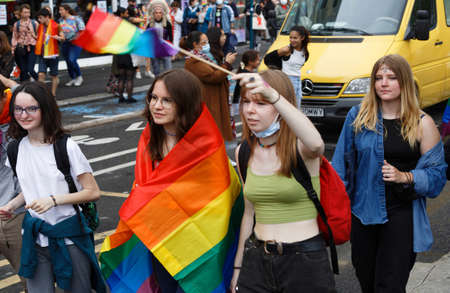 People take part in the Gay Pride - also known as the lesbian, gay, bisexual and transgender people- LGBT pride March 26 June 2021 at the streets of Paris, France.のeditorial素材