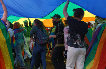 People take part in the Gay Pride - also known as the lesbian, gay, bisexual and transgender people- LGBT pride March 26 June 2021 at the streets of Paris, France.のeditorial素材