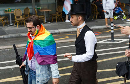 People take part in the Gay Pride - also known as the lesbian, gay, bisexual and transgender people- LGBT pride March 26 June 2021 at the streets of Paris, France.のeditorial素材