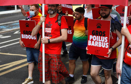 People take part in the Gay Pride - also known as the lesbian, gay, bisexual and transgender people- LGBT pride March 26 June 2021 at the streets of Paris, France.のeditorial素材