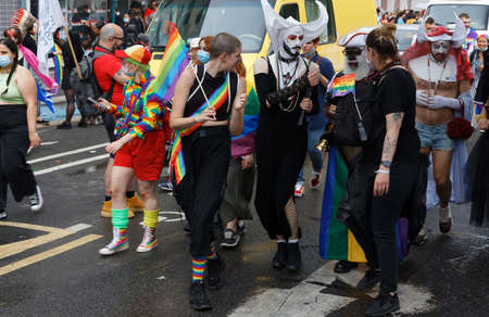 People take part in the Gay Pride - also known as the lesbian, gay, bisexual and transgender people- LGBT pride March 26 June 2021 at the streets of Paris, France.のeditorial素材