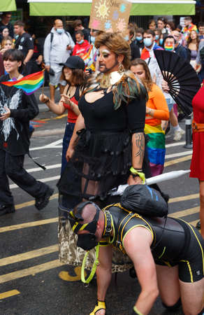 People take part in the Gay Pride - also known as the lesbian, gay, bisexual and transgender people- LGBT pride March 26 June 2021 at the streets of Paris, France.のeditorial素材