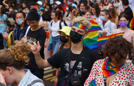 People take part in the Gay Pride - also known as the lesbian, gay, bisexual and transgender people- LGBT pride March 26 June 2021 at the streets of Paris, France.のeditorial素材