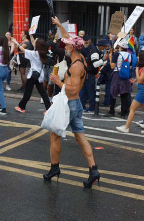 People take part in the Gay Pride - also known as the lesbian, gay, bisexual and transgender people- LGBT pride March 26 June 2021 at the streets of Paris, France.のeditorial素材
