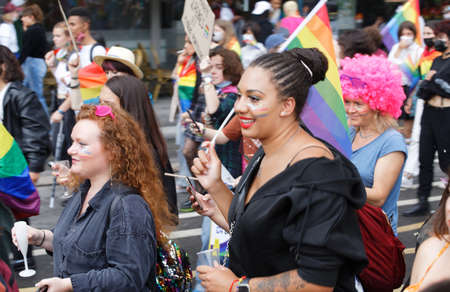 People take part in the Gay Pride - also known as the lesbian, gay, bisexual and transgender people- LGBT pride March 26 June 2021 at the streets of Paris, France.のeditorial素材