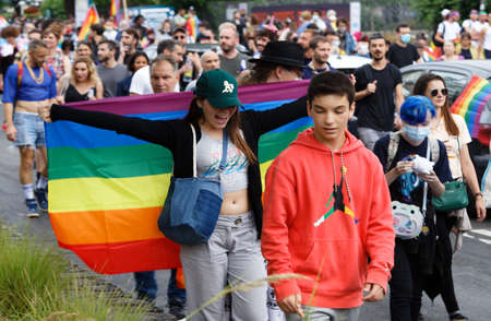 People take part in the Gay Pride - also known as the lesbian, gay, bisexual and transgender people- LGBT pride March 26 June 2021 at the streets of Paris, France.のeditorial素材