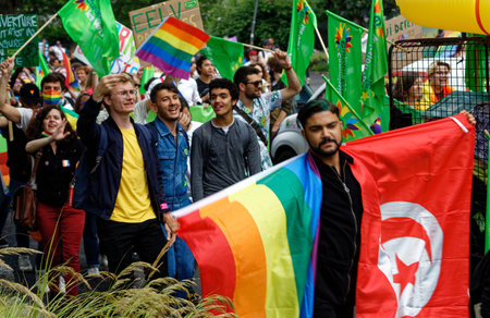 People take part in the Gay Pride - also known as the lesbian, gay, bisexual and transgender people- LGBT pride March 26 June 2021 at the streets of Paris, France.のeditorial素材