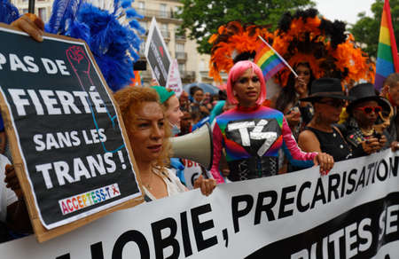 People take part in the Gay Pride - also known as the lesbian, gay, bisexual and transgender people- LGBT pride March 26 June 2021 at the streets of Paris, France.のeditorial素材