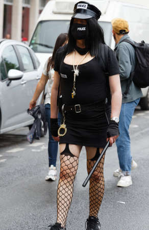 Participant in the Gay Pride - also known as the lesbian, gay, bisexual and transgender people- LGBT pride March 26 June 2021 at the streets of Paris, France.のeditorial素材