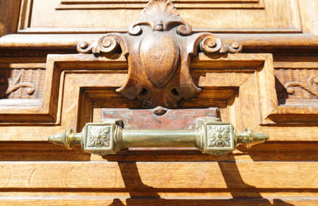 European Vintage old metal wrought iron door knocker. Design detail. Paris.の写真素材