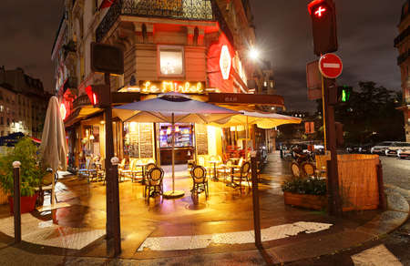 The French traditional restaurant Le Mirbel located in Latin quarter at night, Paris, France.のeditorial素材