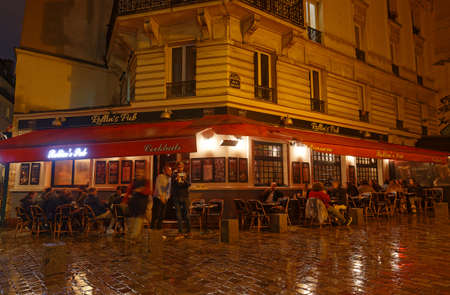 The French traditional restaurant Rollins pub located in Latin quarter at night, Paris, France.のeditorial素材