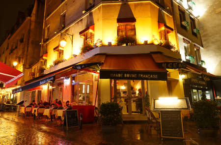The French traditional restaurant Viande bovine francaise located in Latin quarter at night, Paris, France.のeditorial素材