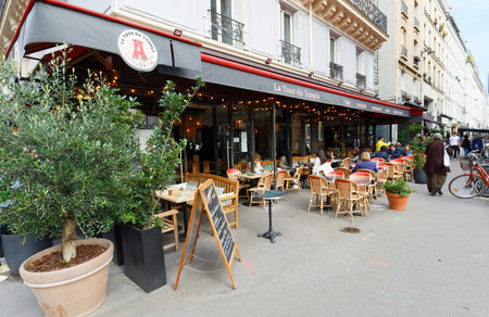 Traditional French cafe la Tour Du Temple located at Temple street in 3rd district of Paris. France.のeditorial素材