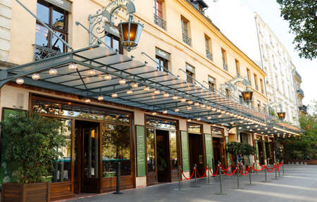 Entrance of the Bouillon Chartier - historic restaurant located at Temple boulevard in 3rd district of Paris . It was founded in a former train station in 1896 .のeditorial素材
