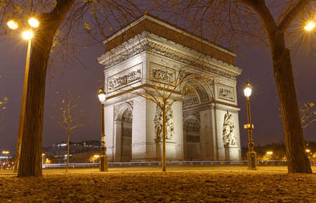 The Triumphal Arch in rainy evening, Paris, France.の写真素材