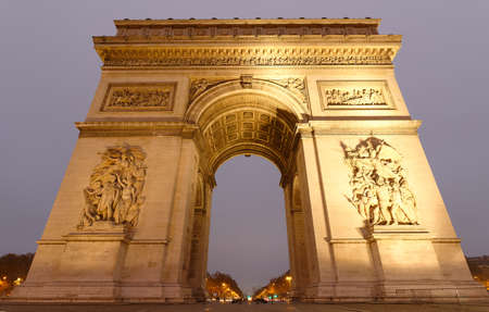 The Triumphal Arch in rainy evening, Paris, France.の写真素材