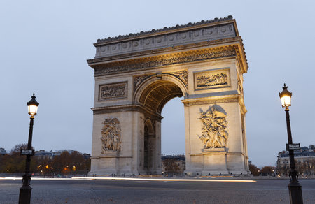 The Triumphal Arch in rainy evening, Paris, France.の写真素材