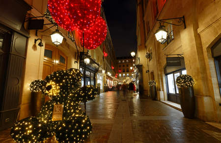 View of Royal Village decorated for Christmas 2021 . Royal Village located near Madeleine in 8th district. This passage is very charming and filled with luxury shops.のeditorial素材