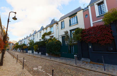Colorful houses at Dieulafoy street in the 13th District is one of the prettiest residential streets in Paris. France.の写真素材