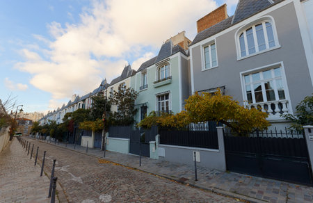 Colorful houses at Dieulafoy street in the 13th District is one of the prettiest residential streets in Paris. France.の写真素材