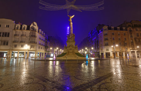 Ancient monumental fountain Sube with golden angel at top was erected in middle of Place dErlon. Champagne-ardenne, Franceの写真素材