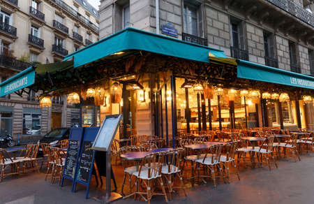 The traditional French cafe Les Insouciants decorated for Christmas 2021 . It located near Saint Germain boulevard in Paris, France.のeditorial素材