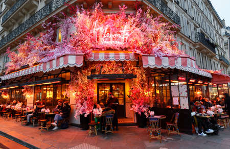 The traditional French cafe Favorite decorated for Christmas 2021 . It located at famous Rivoli street in Paris, France.のeditorial素材
