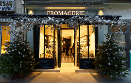 The Cheese shop decorated for Christmas located at famous Rambuteau street in Marais district of Paris. France.のeditorial素材