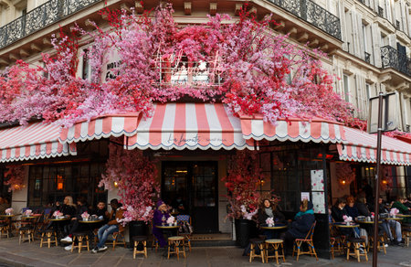 The traditional French cafe Favorite decorated for Christmas 2021 . It located at famous Rivoli street in Paris, France.のeditorial素材