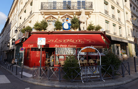 The traditional French cafe Au Petit Suisse decorated for Christmas 2021 . It located near Luxembourg garden in Paris, France.のeditorial素材