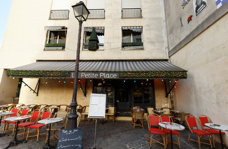 The traditional French cafe La Petite Place located in Marais district of Paris, France.のeditorial素材