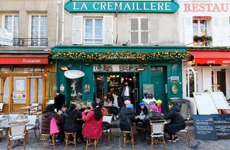 The traditional French restaurant La Cremaillere 1900 decorated for Christmas. It located in Montmartre in 18th district of Paris, France.のeditorial素材