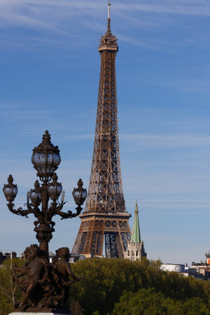 Eiffel tower viewed from famous Alexandre III bridge in Parisの写真素材