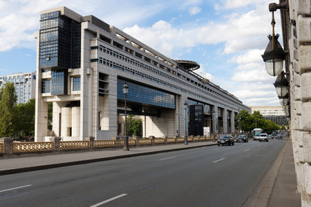General view of the Colbert building, seat of the Ministry of the Economy and Finance on the banks of the Seine river, seen from the Bercy bridge.のeditorial素材