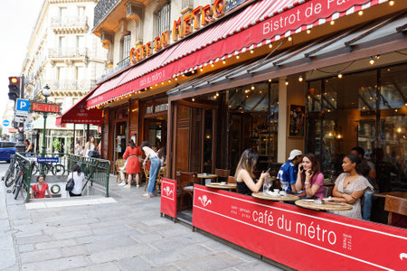 View of typical Parisian cafe du Metro . It is located near famous Saint Germain boulevard in Paris, France.のeditorial素材