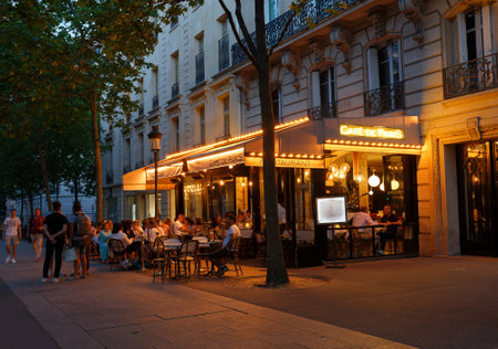 The traditional French cafe de Paris located on the Avenue de Friedland, in the Hausmann style, just opposite the luxurious Hotel Napoleon .のeditorial素材