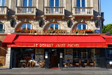The traditional French cafe Le Depart Saint Michel located on the bank of Seine river in Paris.のeditorial素材