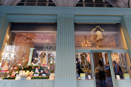 Laduree famous confectionery store windows located at Madeleine square in Paris, France.のeditorial素材