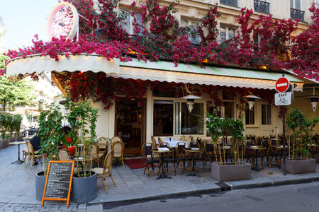 Blanchet is corner cafe decorated with flowers. It located near the district of Chatelet in 1st district of Paris. France.のeditorial素材