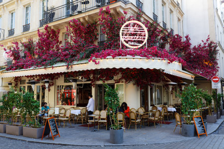 Blanchet is corner cafe decorated with flowers. It located near the district of Chatelet in 1st district of Paris. France.のeditorial素材