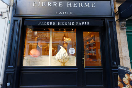 Exterior view of pastry shop of French famous pastry chef Pierre Herme in central Paris in Saint Germain district.のeditorial素材