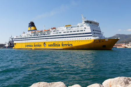 A yellow ferry from the company Corsica ferries in the port of Toulon makes connections with Corsica by crossing the Mediterranean Seaのeditorial素材
