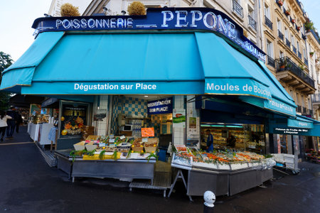 Pepone Poissonerie is historic fresh fish shop located on rue Lepic, Montmartre, Parisのeditorial素材