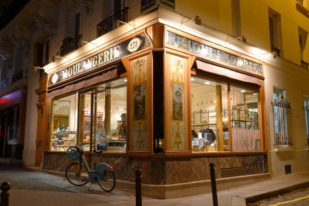 The vintage bakery and cake shop Vandermeersch located in 12th district of Paris. The front shows the ornaments of woodwork , set under glass, with gold leaf.のeditorial素材