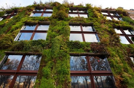 Quay Branly museum - green building with a large green wall. It located just a stone throw from the Eiffel tower. Paris. France.のeditorial素材