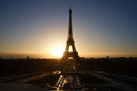 Eiffel Tower and fountains near it at dawn in Paris.の写真素材